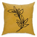 Coussin jaune à motif feuillage noir